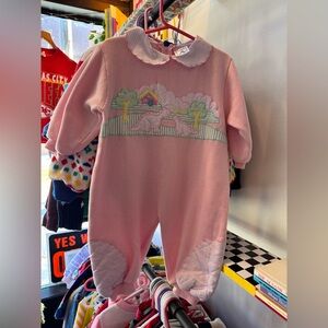 Adorable pink dinosaur fleece romper